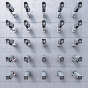 25 cctv camera watching you on concrete wall