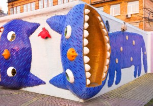 KIEV, UKRAINE - MARCH 9, 2014: The playground on Landscape Alley made by Konstantin Skretutskiy with the sculptures of meowing cats, on March 9 in Kiev.